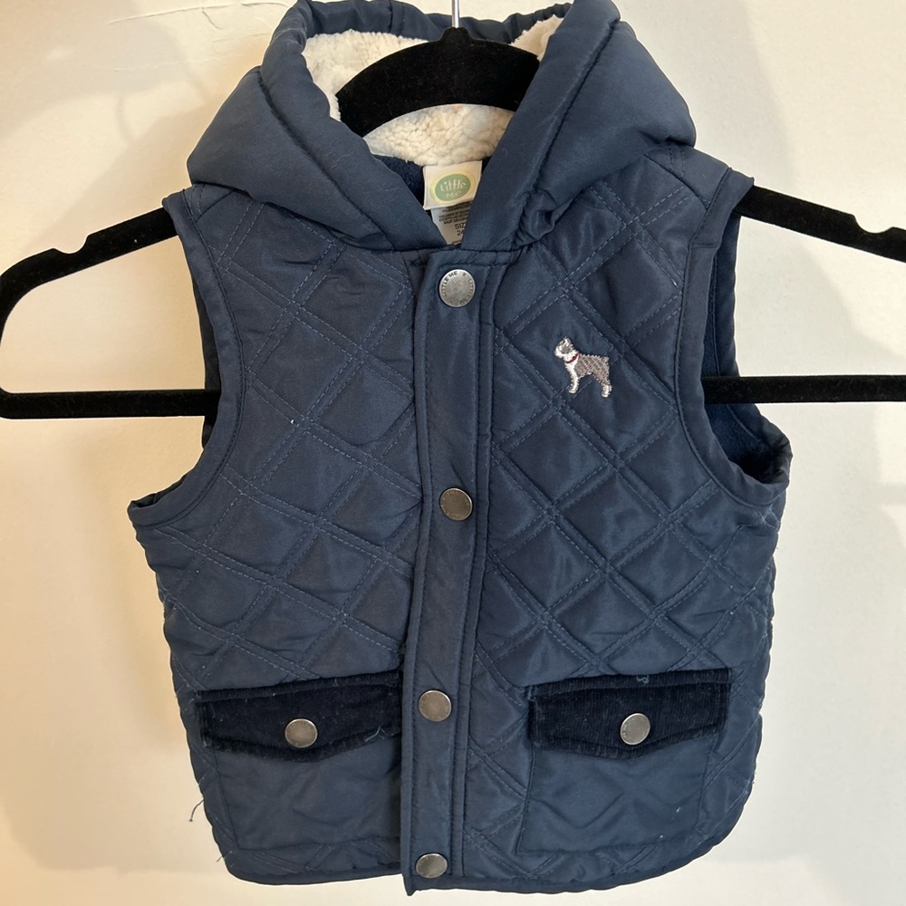 Boys navy blue puffer vest with fur inside. Size 24M